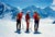 Say Cheese! by Toni Frissell A group of skiers admire the view from the top of a piste on the infamous “Haute Route",...