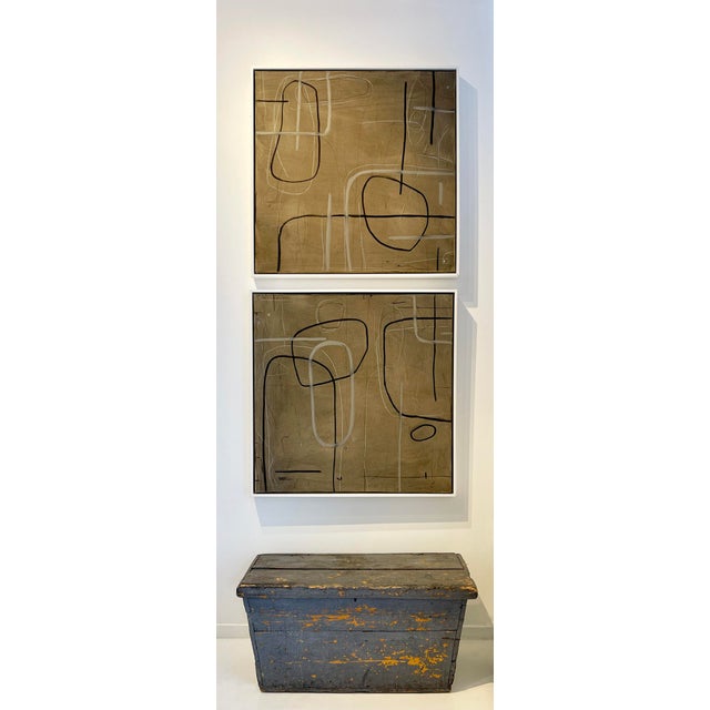 Good vintage condition This early-20th century vintage painted wood trunk features a simple, utilitarian form highlighted...