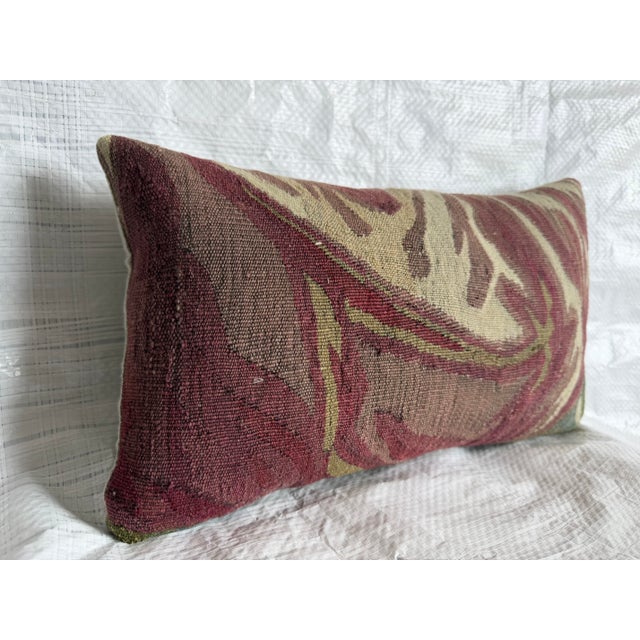 This 17th century Brussels tapestry pillow features a bold Baroque composition rendered in an abstract woven pattern. The...