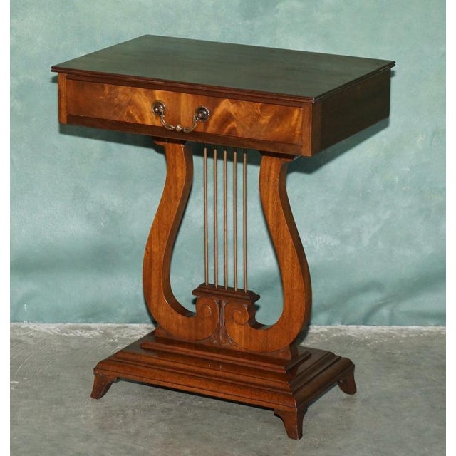 Regency Style Mahogany Lyre-Form Side Tables with Brass. A very attractive pair of Regency style mahogany side or lamp...