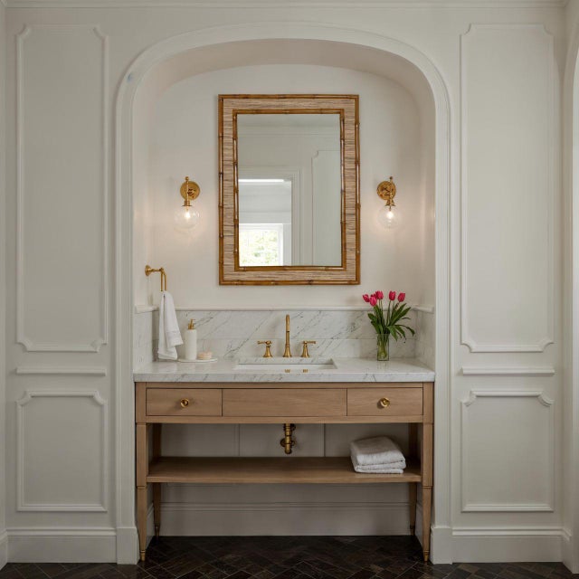 Cameron Wall Mirror Material: Bamboo Item Bevel: Yes Hanger Type: D-Ring Hangs Both Ways: Yes Glass Dimensions: 32x21 Care...