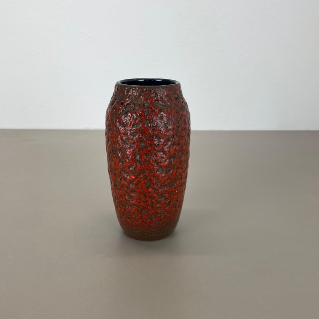 Article: Fat lava art vase, heavy Brutalist glaze Producer: Scheurich, Germany Decade: 1970s This original vintage vase...