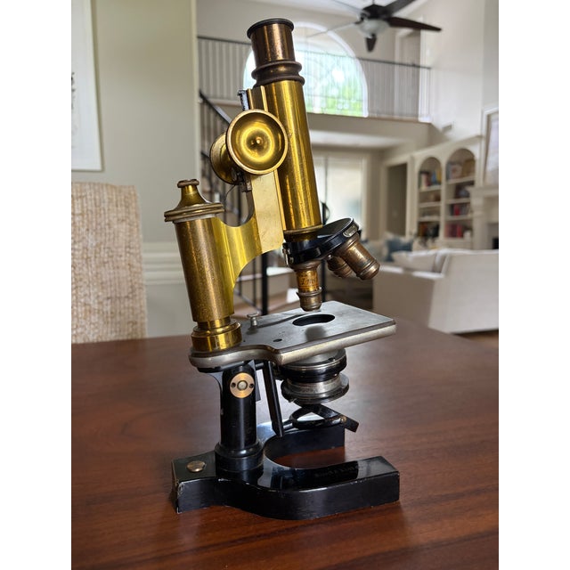 An exceptional early 20th-century Bausch & Lomb Optical Company brass microscope, manufactured in Rochester, New York and...