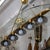 Rare brass five-light pendant by Pietro Chiesa for Fontana Arte. Features a large curved glass element. Exquisitely...