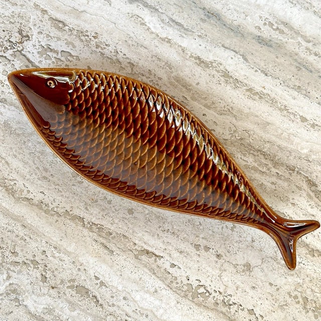 A striking piece of Scandinavian ceramic design by renowned Swedish designer **Stig Lindberg** for **Gustavsberg,...