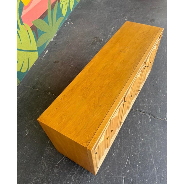 A great mid century sideboard that can be used as a living room console, entry piece, sideboard, etc. Solidly made and in...