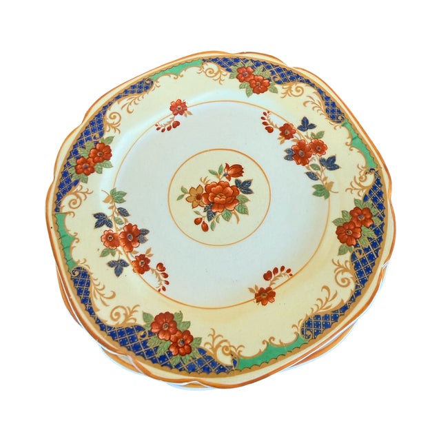 Build a stunning historic table setting with this rare set of twelve antique bread and dessert plates. Produced in England...