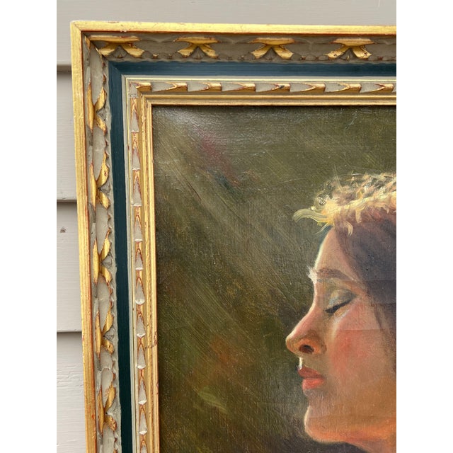 This striking oil painting, titled “Sun and Shade,” is a powerful portrait of a woman in profile, her features bathed in...