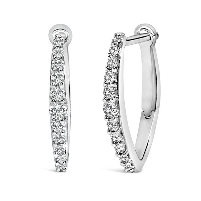 Embrace the essence of enduring elegance with these resplendent hoop earrings, artfully fashioned from lustrous 10K white...