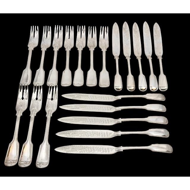 Exceptional 20-piece Victorian English sterling silver fish service, comprising ten fish knives and ten matching fish...