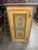An early 19th century Scandinavian painted pine cupboard or armoire with a stepped cornice, single-door painted in sage...