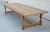 Designed to withstand any climate, this teak dining table can be used either indoors or outdoors. Seen here in 144" x 48"...