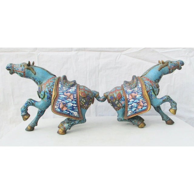 Vintage 1960s' Chinese Cloisonne Enamel Horses. Bright blue enamels with archaic Chinese designs and good luck bats over...