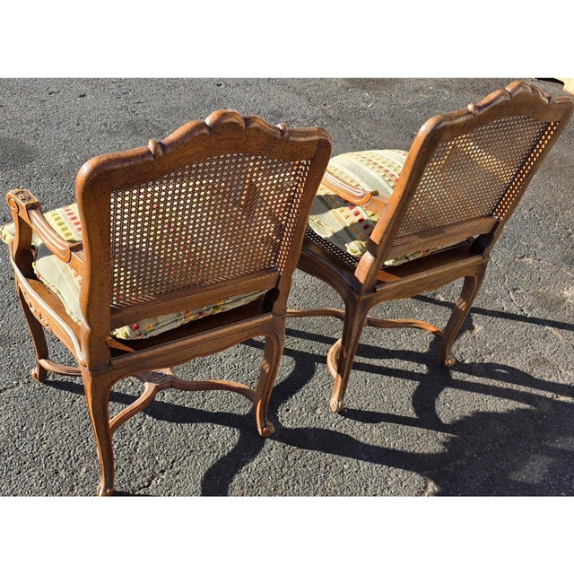French Pr of Early 20th Century French Louis XV Style Carved Walnut Fauteuils W/Cane Seats & Backs, Original Painted Highlights W/Loose Upholstered Cushions For Sale - Image 3 of 9