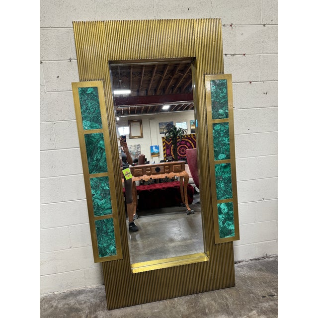 We have two available. What a statement mirror! Float it behind a table on the floor or hang it vertically or...