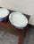 Design Plus Gallery presents a Pair of Blue + White Chinoiserie Ceramic Oval Planters. This ceramic pair offers oval forms...