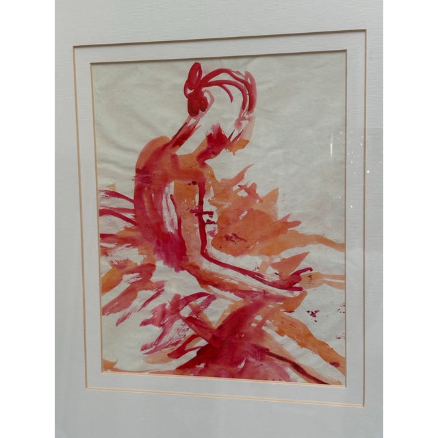 Vintage watercolor ballet dancer painting in soft coral and rose tones. Framed and mounted in a simple black frame....