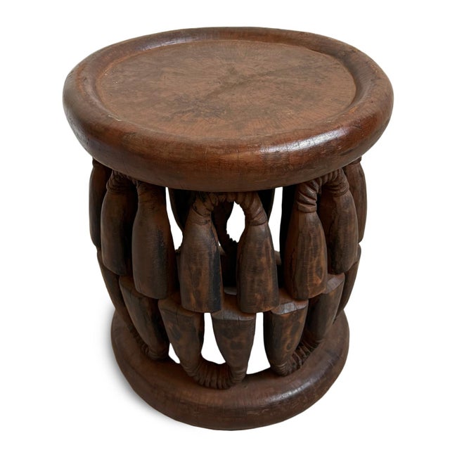 Authentic vintage hand carved Bamileke tribal wood stool/side table. Masterfully crafted from one piece of indigenous...