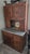 A exceptional early 20th-century solid oak Hoosier-style kitchen cabinet and hutch. Featuring authentic period...