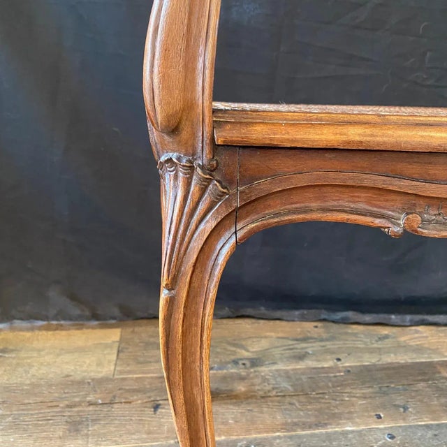 French Provincial Louis XV Carved Walnut Bench or Ottoman With Caning For Sale - Image 4 of 12