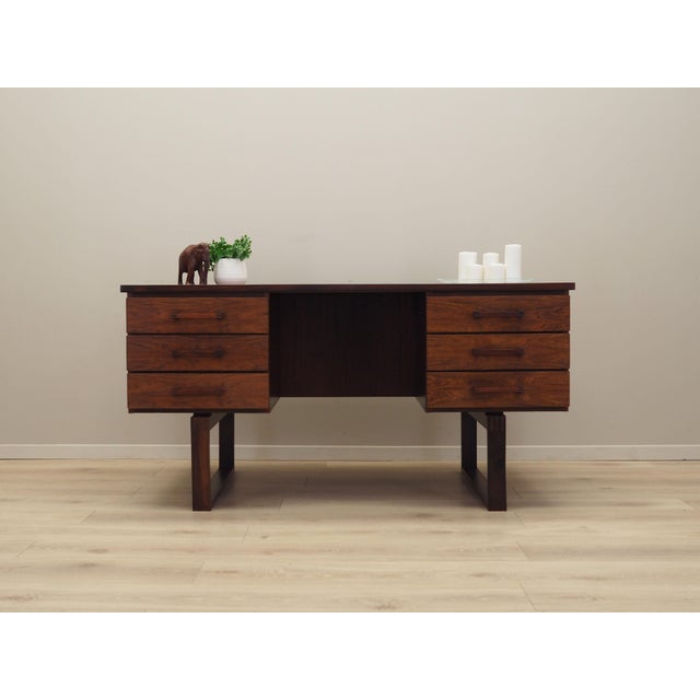 The desk was made in the 1960s, manufactured at the Danish Dyrlund manufactory. Designed by the duo of well-known...