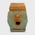 This low, ceramic garden drum is drip glazed in the manner of ancient Chinese sancai ware, cloaked in translucent shades...