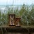 Create a warm, inviting glow in your home with this stunning set of Forest Trees Punched Metal Candle Holders. Designed...