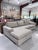 A sophisticated Ethan Allen Conway sectional sofa featuring a clean-lined contemporary silhouette and a spacious chaise...