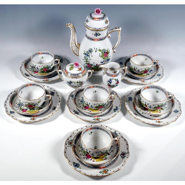 Herend service consisting of 21 parts: 1 coffee pot with lid, 1 milk jug, 1 sugar bowl, 6 cups, 6 saucers and 6 dessert...