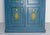 French Armoire all blue painted and patinated with green and yellow floral decoration. Two doors with one key. Four...