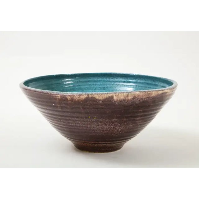 A unique bowl produced by Accolay Pottery in France. One of many pieces of Accolay in our inventory, we love this accent...