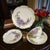 This R.C. Versailles Bavaria painted gilded purple Aster floral porcelain 4-piece tea set is a vintage piece originating...