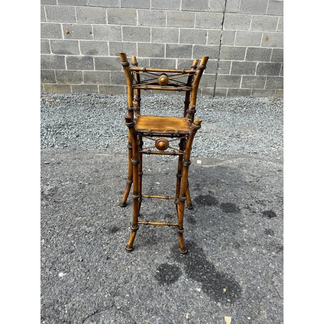 Pair of Vintage Victorian Style Faux Bamboo Metal Nesting Plan Stands They feature metal top, bamboo motif splayed legs...