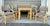 Exceptional vintage McGuire rattan games and dining set comprising a revolving flip-top table, two side chairs, and two...
