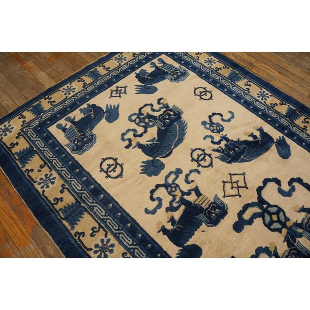 Chinese 1880s Antique Small Blue and Ivory Chinese Ningxia Small Foo Dog Greek Key Rug For Sale - Image 3 of 10