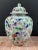 This stunning Chinese porcelain ginger jar features an intricately hand painted floral and butterfly pattern in a vibrant...