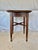 This 20th Century English Oak Tavern Side Table dates back to the early 1900's. The piece features a classic circular wood...