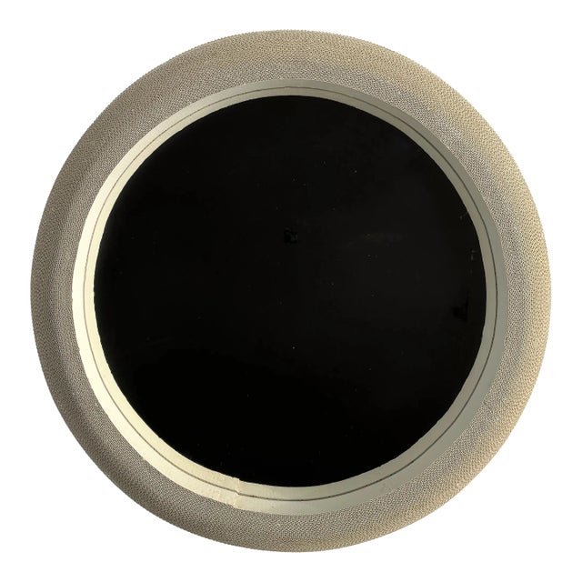 A single vintage round mirror with convex shaped porthole style corrugated cardboard frame. This postmodern mirror by...