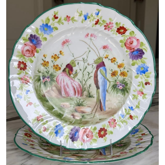 Reminiscent of Aesop's Fable, The Ant and the Grasshopper, here is a pair of antique decorative plates. Artfully hand-...
