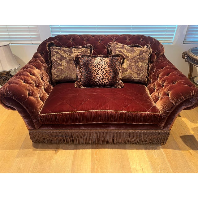 This Plush Love Seat is covered with a Rich Color of Brown. Tufted with a beautiful velvet fabric. The frame is made of...