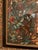 Exquisitely done needlepoint with a gorgeous wood frame. The artist shows a quaint depiction of a child carrying a young...