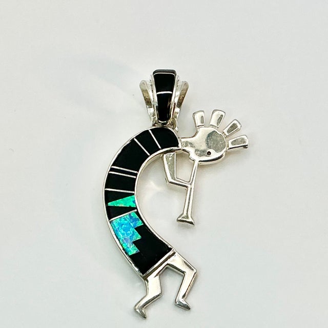Award-Winning American Dine Navajo Silversmith Calvin Begay (1965, Gallup, NM) is a master at channel, mosaic and...