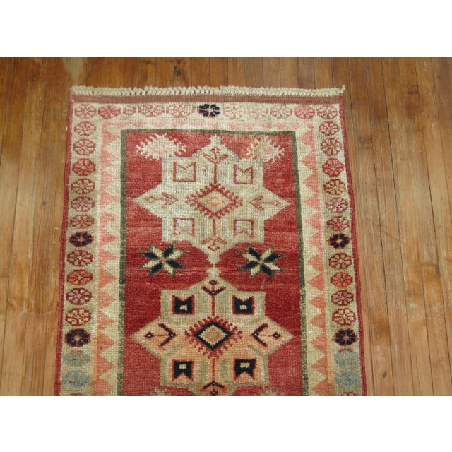 a Mid century Turkish Runner in a predominant red Tone rug no. 30868