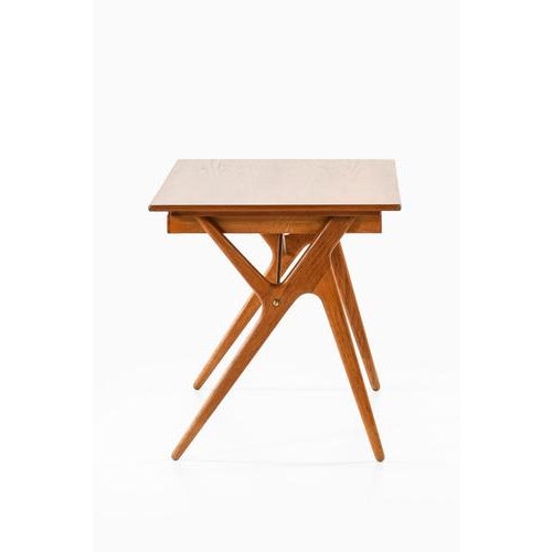 This rare freestanding desk, produced in denmark during the 1950s by an unknown designer, exemplifies the refined...