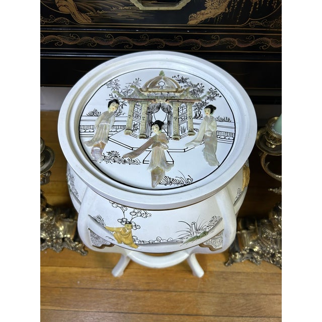 Tall vintage Chinoiserie stool or side table featuring figural mother-of-pearl inlay, hand-drawn garden scenes, gilt...