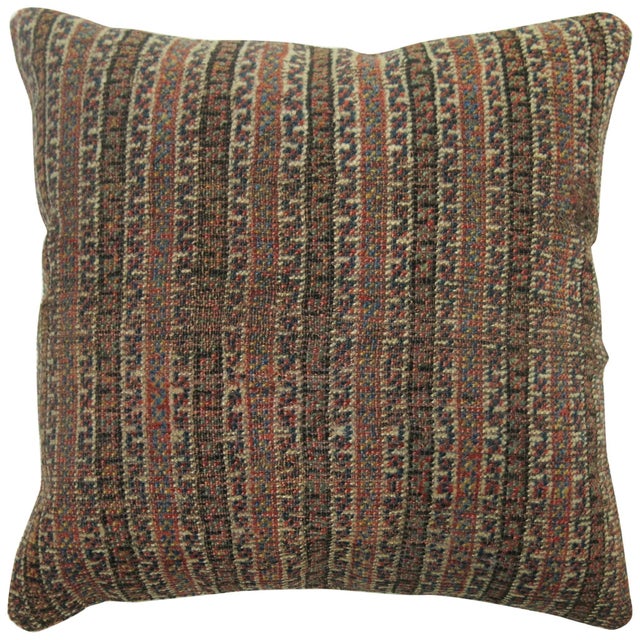 Pillow made from a 20th century tribal Persian rug with cotton back. Zipper closure and foam insert provided. Measures:...