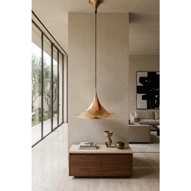 The “Semi” pendant lamp, designed by Danish architects Claus Bonderup (1944–2022) and Torsten Thorup (b. 1943) for the...