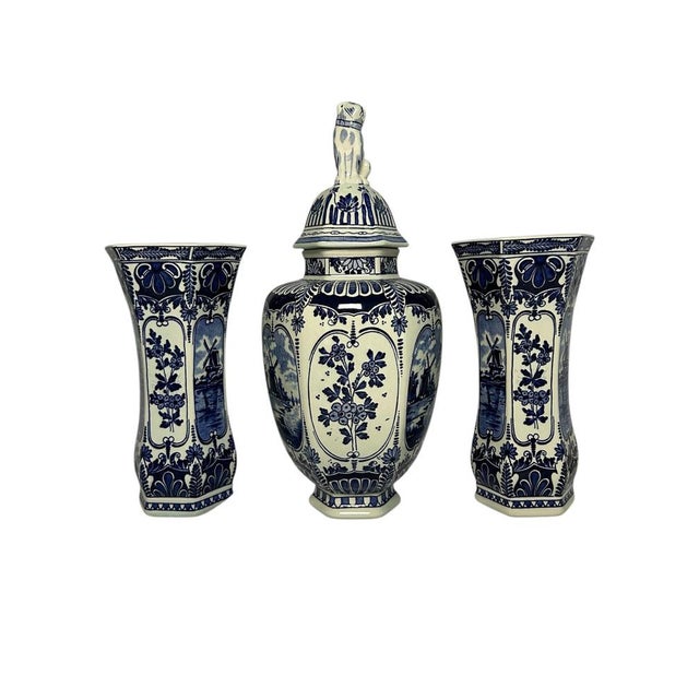 Vintage three-piece Delft-style garniture set by Boch, made in Holland in the mid-20th century. The set consists of a...
