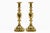 Antique pair of brass “Ace of Diamonds” candlesticks featuring a multi-faceted diamond-shaped knop or bulge in the center...