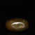 This gourd-shaped glass snuff bottle is a lovely piece of traditional Chinese decorative art. The interior of the bottle...
